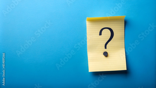 Note paper with question mark on panoramic blue background