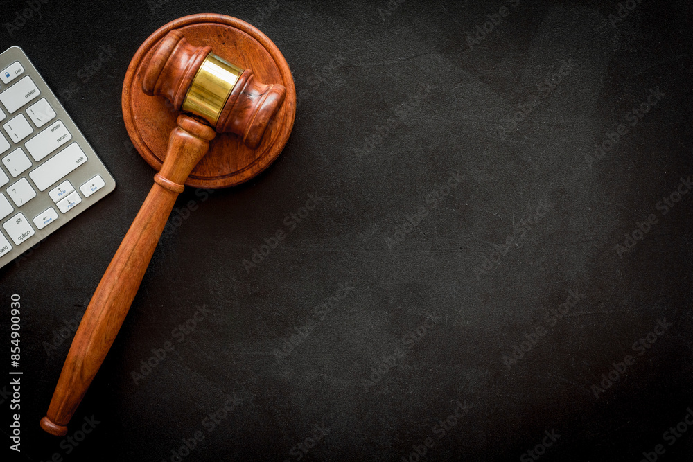 Lawyer desktop with judge gavel and keyboard, top view Lawyer desktop with judge gavel and keyboard, top view