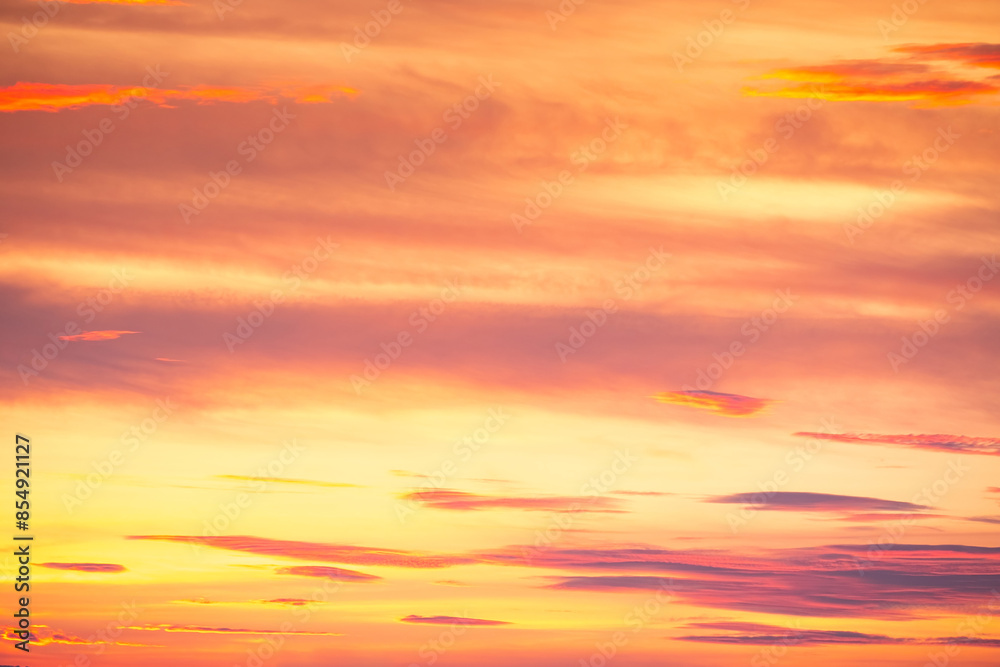 Fototapeta premium Beautiful , luxury soft gradient orange gold clouds and sunlight on the blue sky perfect for the background, take in everning,Twilight, Large size, high definition landscape photo