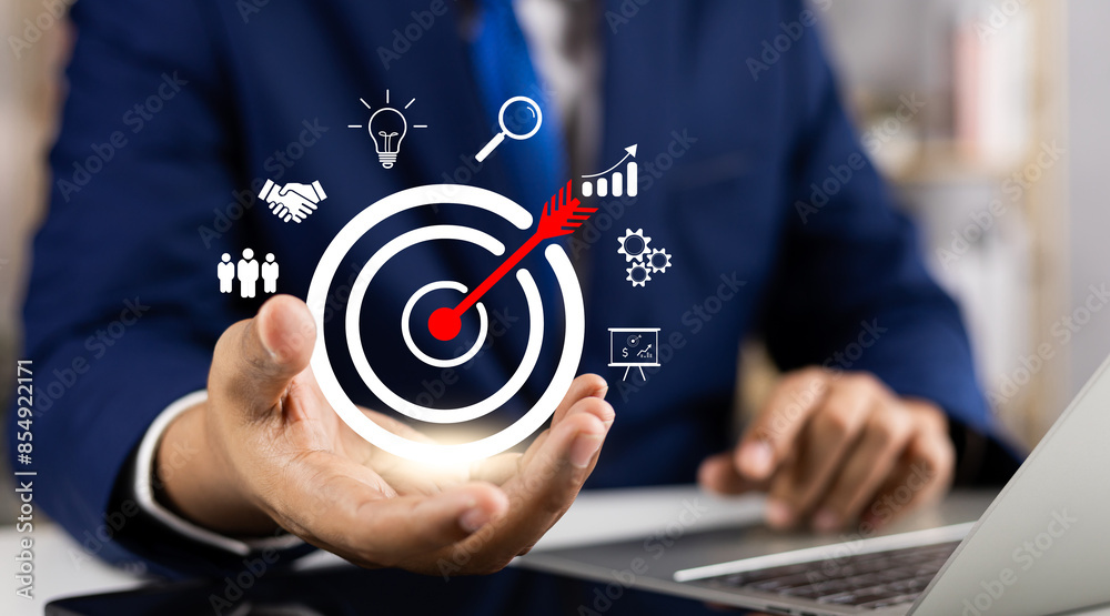 Concept of business strategy and future sustainable business finance action plan. Hand holding target board for creative and set up business objective target and success and business goals concept. Concept of business strategy and future sustainable business finance action plan. Hand holding target board for creative and set up business objective target and success and business goals concept.