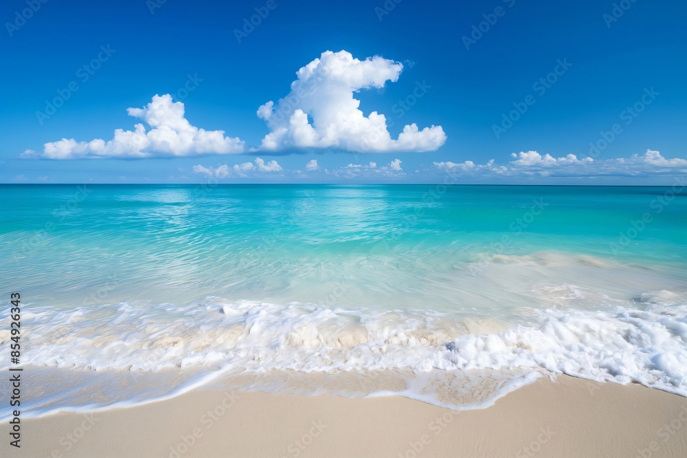 Tranquil panoramic view of the serene and pristine turquoise ocean with crystal-clear waters, gentle waves, and a white sandy shore, creating a tranquil scene under a blue sky in a tropical paradise Tranquil panoramic view of the serene and pristine turquoise ocean with crystal-clear waters, gentle waves, and a white sandy shore, creating a tranquil scene under a blue sky in a tropical paradise
