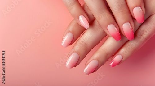 Obraz na płótnie Gradient nail art and spa treatment for hands Close up of woman s elegant hands with manicure and soft skin Baby boomer nail design on woman s nails on pink backdrop Ample space for text w salonie