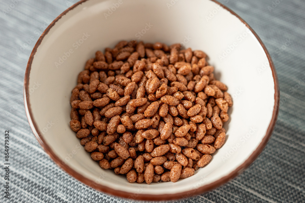 Puffed rice cereal with chocolate in a bowl Puffed rice cereal with chocolate in a bowl