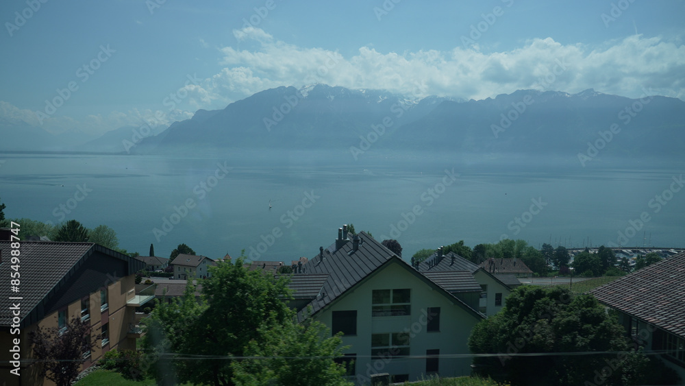 Naklejka premium Panoramic View of Lake Geneva with Alpine Mountains in Background, Switzerland