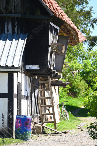 The traditional half timbered house in old polish village. Example of half timber architecture. photo