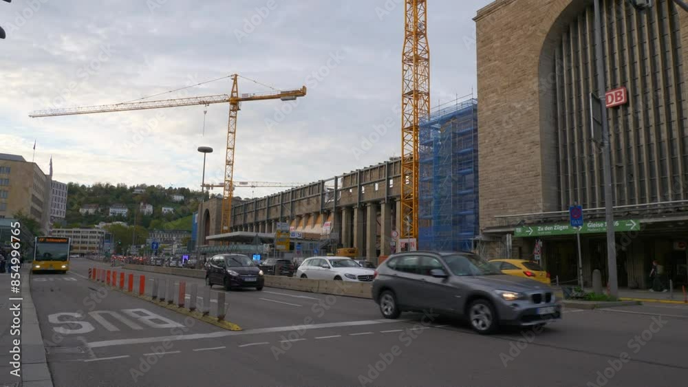 sunset time stuttgart city center train station construction traffic street slow motion panorama 4k germany