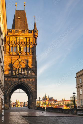 Old Town Bridge Tower at the beginning of the Charles Bridge and with Prague caste on the background, Prague, Czech Republic, Europe.