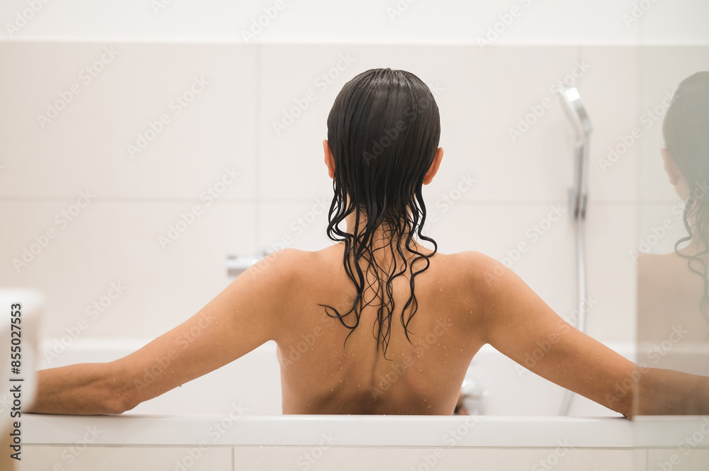 Waist up picture of a nude woman in a shower Waist up picture of a nude woman in a shower