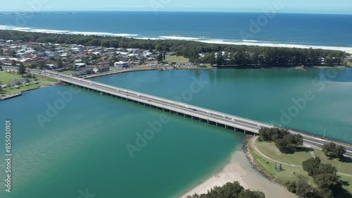 Aerial parallax around Windang Bridge between Lake Illawarra and the Pacific ocean photo