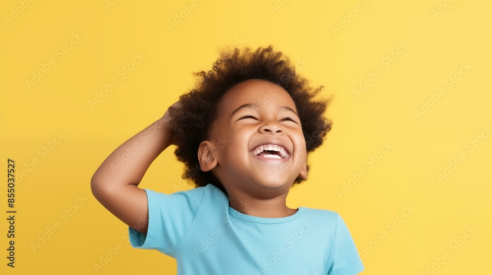 Cute little african american child laughing and smiling, isolate on background Cute little african american child laughing and smiling, isolate on background