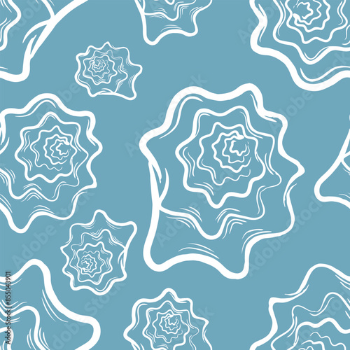 Seamless seashell pattern on blue background.