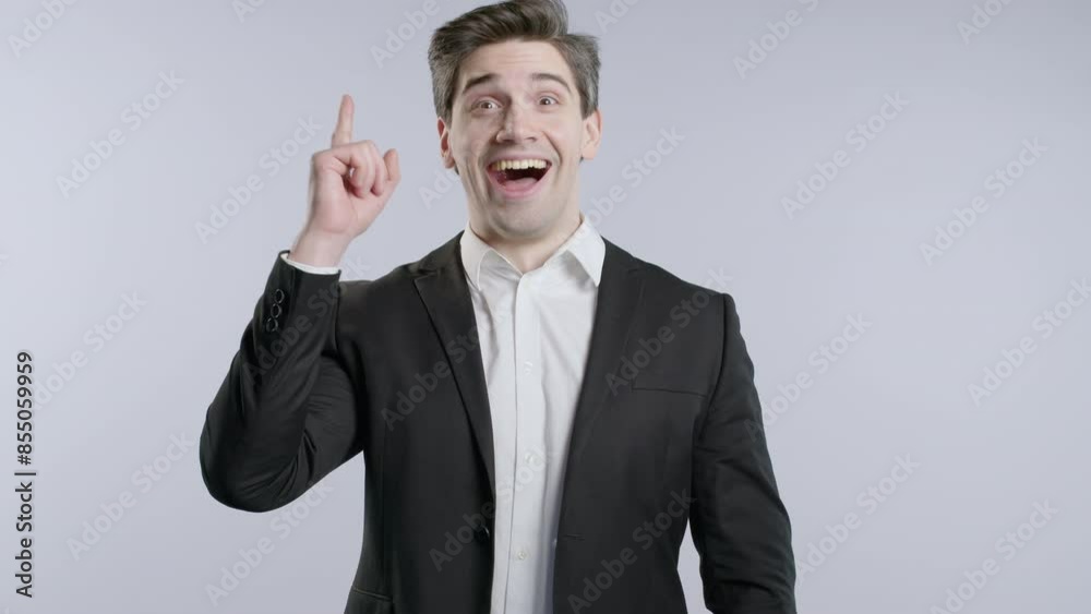 Genius Idea. Resourceful 30S Aged businessman.Eureka Moment,Pointing Finger Up Genius Idea. Resourceful 30S Aged businessman.Eureka Moment,Pointing Finger Up