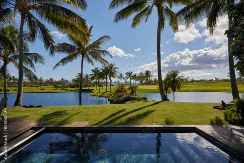 Pool Overlooking Coastal Golf Course at Hawaii Resort photo