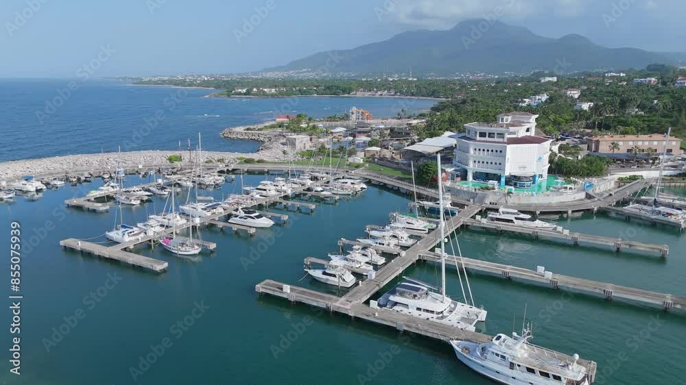 Boats and yachts moored at harbour of Marina Ocean World in Puerto Plata Dominican Republic. Aerial view Boats and yachts moored at harbour of Marina Ocean World in Puerto Plata Dominican Republic. Aerial view