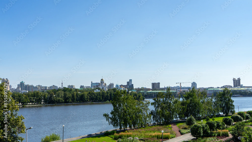 View of embankment of city pond, Iset River, Yekaterinburg, Russia. View from Boris Yeltsin Presidential Center View of embankment of city pond, Iset River, Yekaterinburg, Russia. View from Boris Yeltsin Presidential Center
