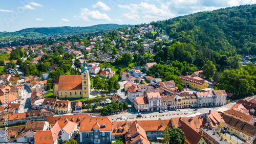 This cozy city of Samobor is beautifully captured from above, showcasing its charming streets, historic buildings, and lush greenery. Known for its picturesque old town and vibrant cultural life photo