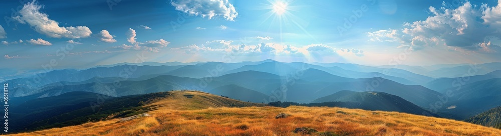 Fototapeta premium Sunny Day View Over Mountain Range With Golden Grass