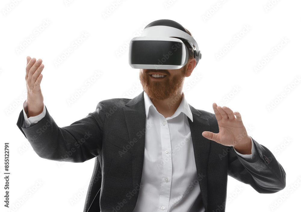 Smiling man using virtual reality headset while sitting in office chair on white background Smiling man using virtual reality headset while sitting in office chair on white background