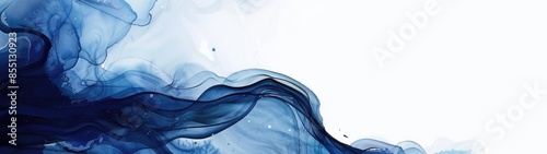 Abstract blue ink in water creating flowing patterns.

