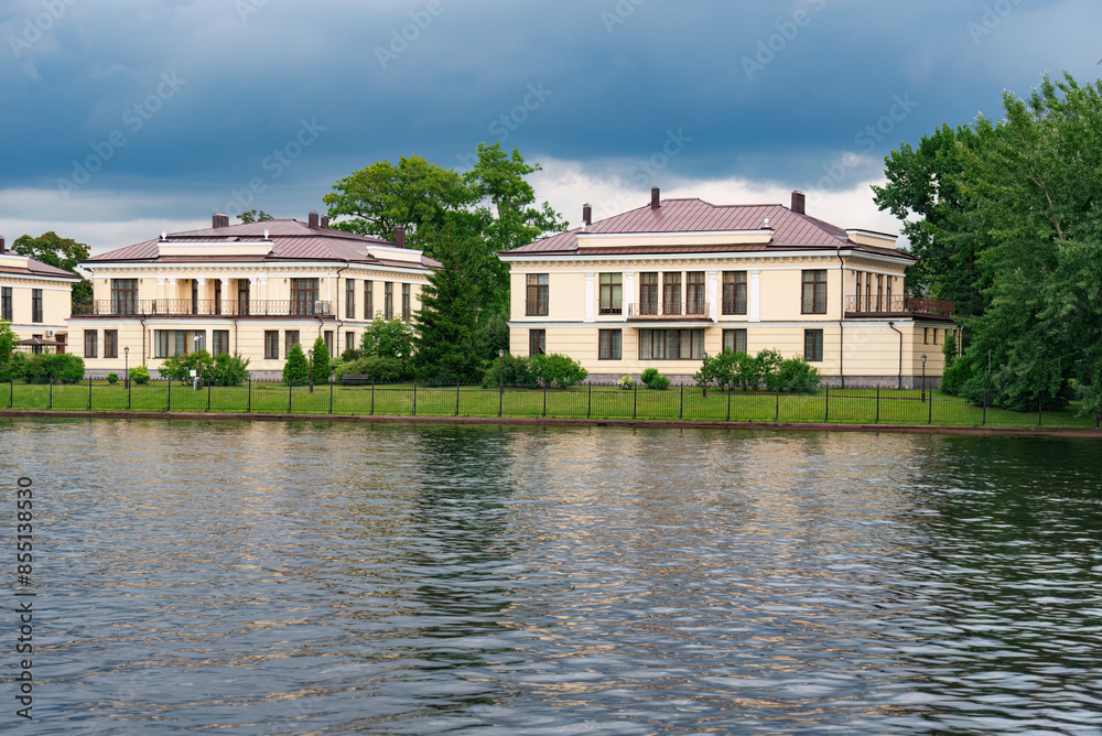 An embankment with luxury houses along the city reservoir