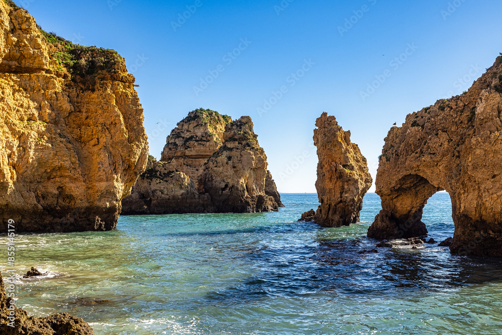 Ponta da Piedade is a unique rock formation with famous grottos in the ocean at Lagos, Algrave, Portugal Ponta da Piedade is a unique rock formation with famous grottos in the ocean at Lagos, Algrave, Portugal