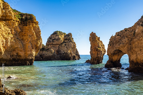 Ponta da Piedade is a unique rock formation with famous grottos in the ocean at Lagos, Algrave, Portugal