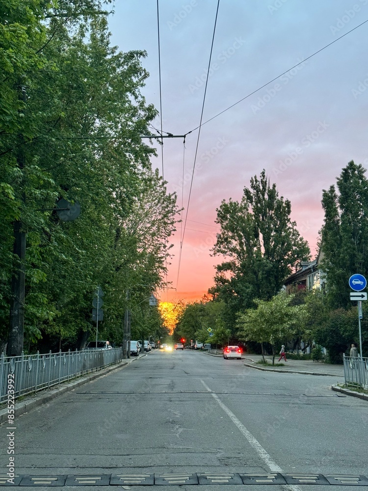 Pink sunset against the backdrop of mountains, roads Pink sunset against the backdrop of mountains, roads