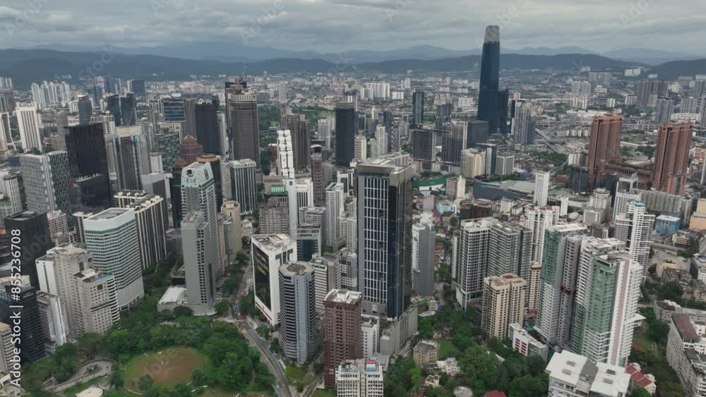 cloudy day kuala lumpur city downtown park aerial panorama 4k malaysia cloudy day kuala lumpur city downtown park aerial panorama 4k malaysia