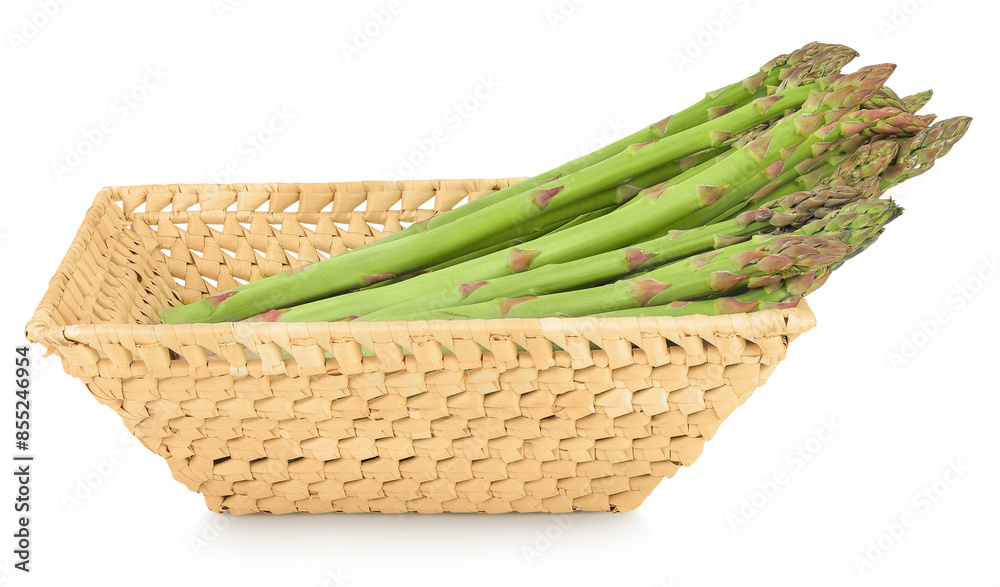 fresh asparagus in in a wicker basket isolated on white background fresh asparagus in in a wicker basket isolated on white background