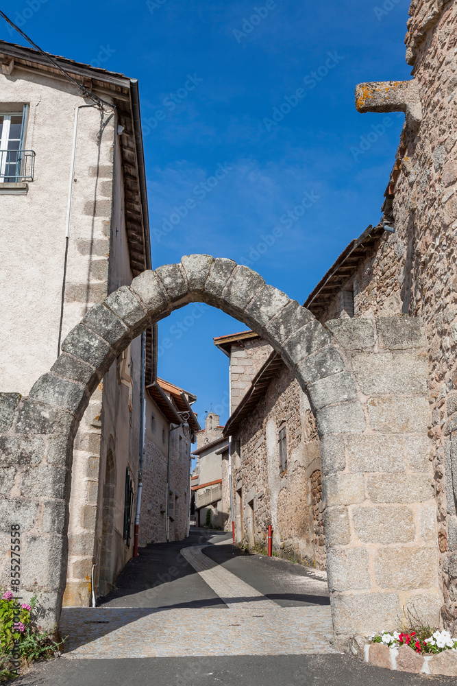 Fototapeta premium Historic medieval village of Cervières, Loire, France, medieval village. Gate of Farges, Rue des Farges