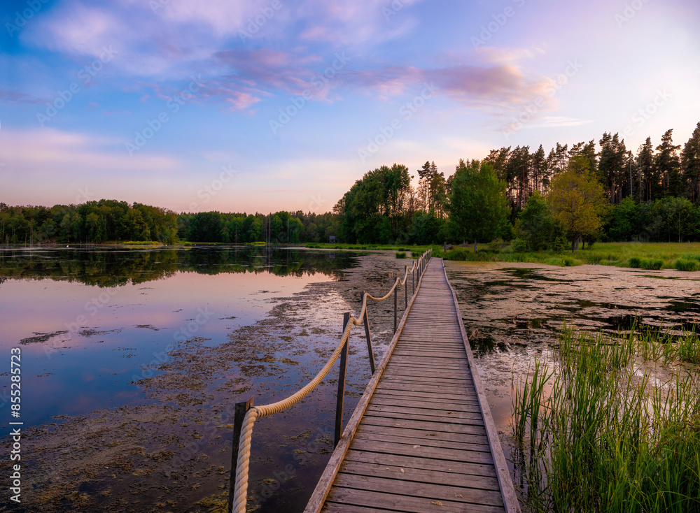 wooden bridge over lake wooden bridge over lake