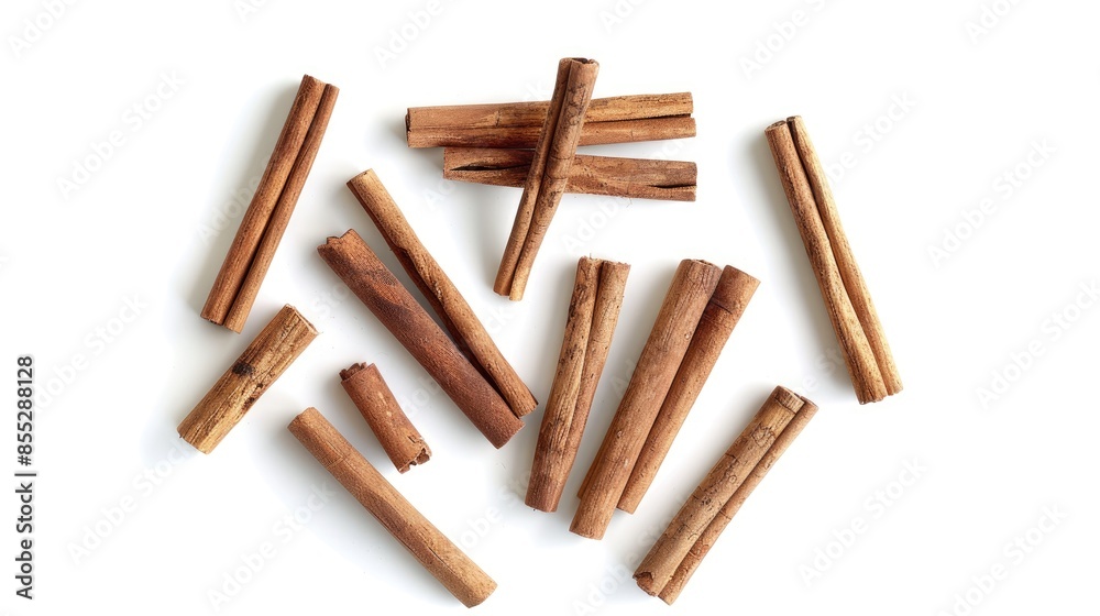 Cinnamon sticks positioned individually on a white background Cinnamon sticks positioned individually on a white background