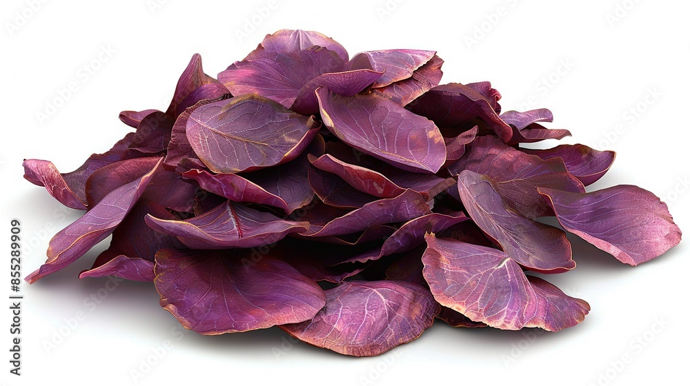 A cluster of purple foliage rests atop a white table adjacent to an unopened wine bottle positioned atop the same surface A cluster of purple foliage rests atop a white table adjacent to an unopened wine bottle positioned atop the same surface