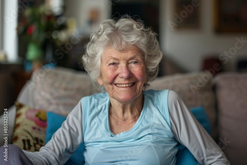Happy senior woman relaxing at home smiling and posing
