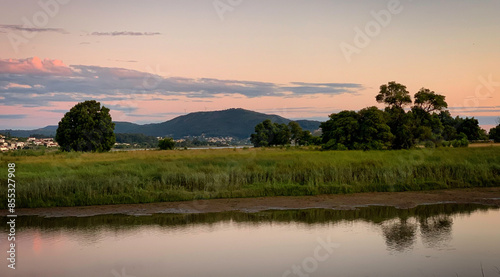 Sunset over the river Minho and Illa Morraceira and surrounding mountains near Tabagón, O Rosal, Galicia, Spain, June 2020