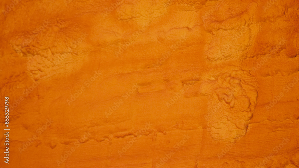 Fototapeta premium Orange painted wall background pattern