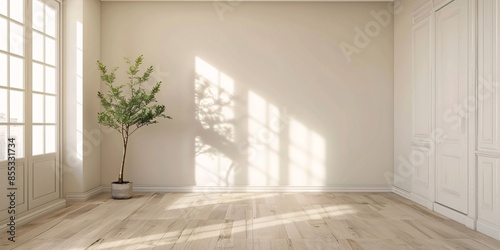 Elegant room remodel featuring light wood grain vinyl flooring and cream painted walls