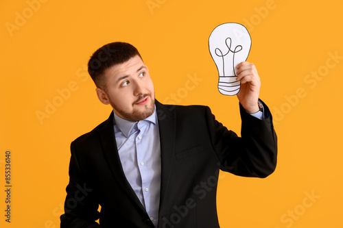 Young businessman with draw...