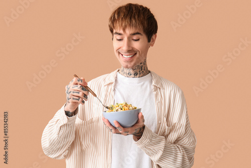 Man holding bowl with cerea...