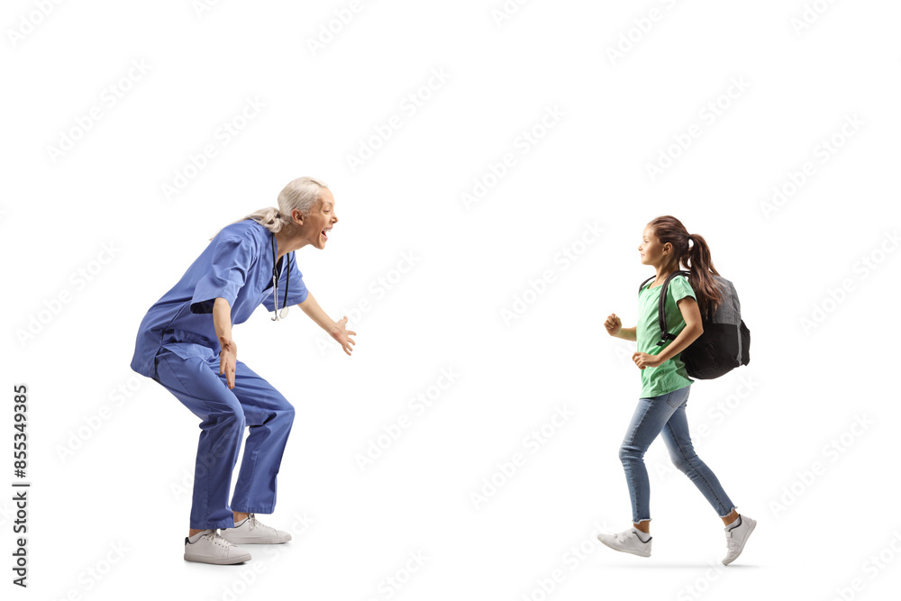 Profile shot of a happy female health care worker waiting to hug a kid Profile shot of a happy female health care worker waiting to hug a kid