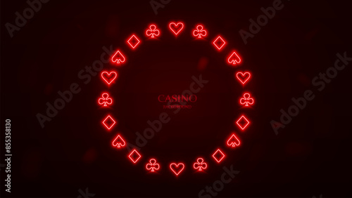 Photography A casino frame made of neon poker card suits on a red background.