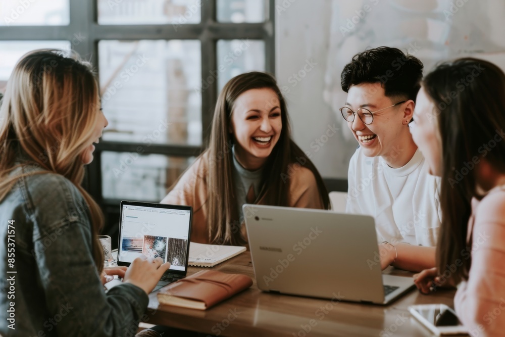 Group of young asian and caucasian business people working together in office. Group of young asian and caucasian business people working together in office.