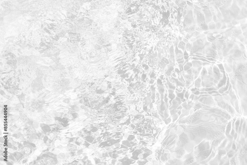 White water with ripples on the surface. Defocus blurred transparent white colored clear calm water surface texture with splashes and bubbles. Water waves with shining pattern texture background. White water with ripples on the surface. Defocus blurred transparent white colored clear calm water surface texture with splashes and bubbles. Water waves with shining pattern texture background.