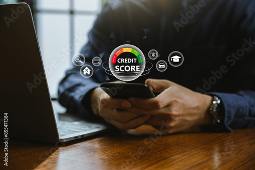 Foto Credit score concept, Businessman using smartphone with credit score for checking rating for business and personal loan