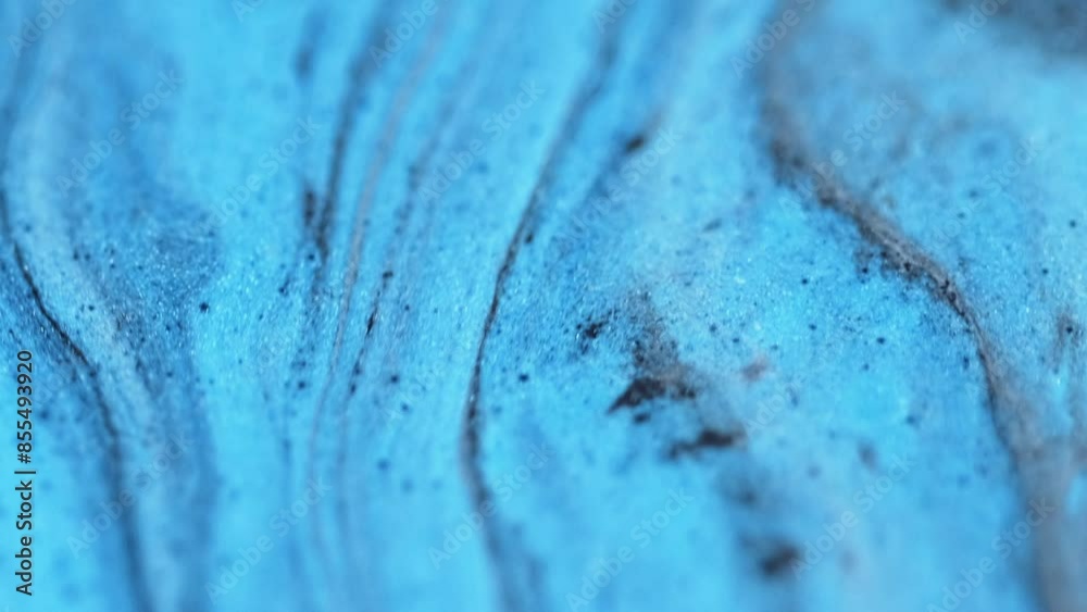 Magic liquid acryl. Glitter ink mix. Defocused blue black color drip wave motion wet shimmer gel oil emulsion particles art abstract background. Magic liquid acryl. Glitter ink mix. Defocused blue black color drip wave motion wet shimmer gel oil emulsion particles art abstract background.