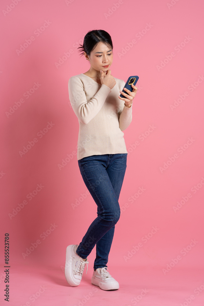 Image of beautiful Asian woman posing on a white background Image of beautiful Asian woman posing on a white background