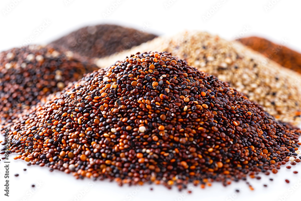 A photograph of multicolored quinoa kernels. The quinoa is detailed and demonstrates its unique shape and texture on a plain white background. A photograph of multicolored quinoa kernels. The quinoa is detailed and demonstrates its unique shape and texture on a plain white background.