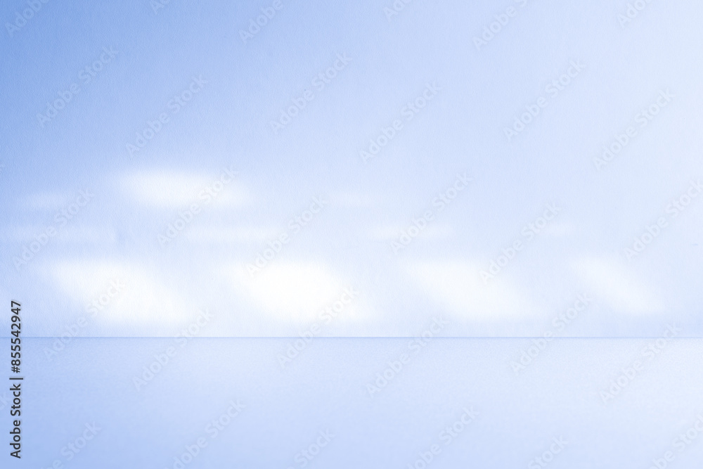 Empty studio interior background and backdrop and product display stand with shadow white and blue on blank text background for inserting text. Empty studio interior background and backdrop and product display stand with shadow white and blue on blank text background for inserting text.
