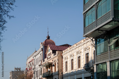 View of a street with beautiful houses against a blue sky, Tbilisi, Georgia. photo