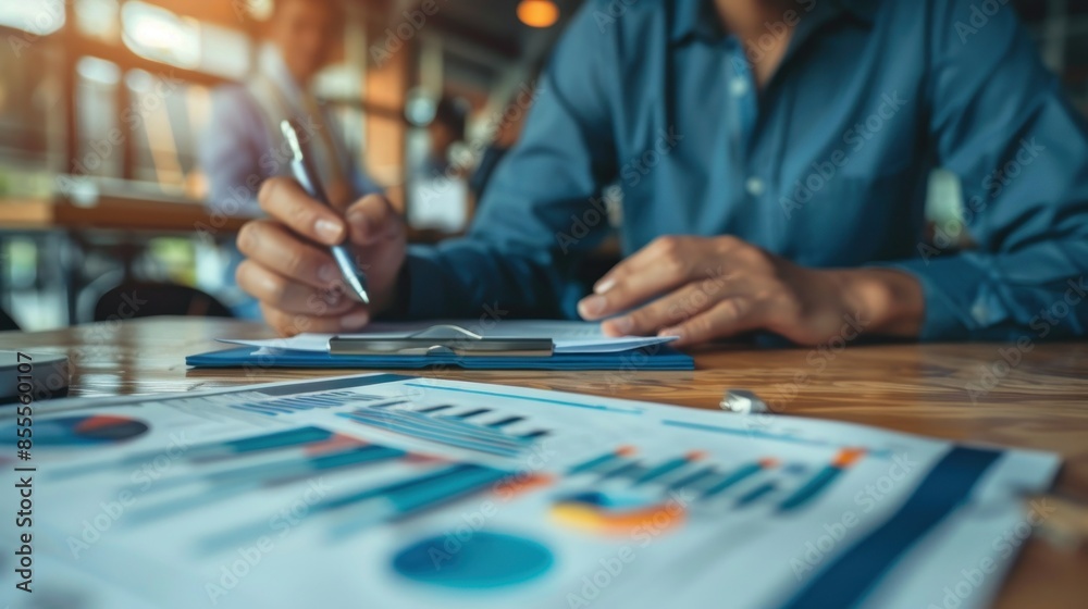 An image of a financial advisor meeting with clients, discussing investment options and market trends. The scene captures the collaborative and consultative nature of financial planning. An image of a financial advisor meeting with clients, discussing investment options and market trends. The scene captures the collaborative and consultative nature of financial planning.